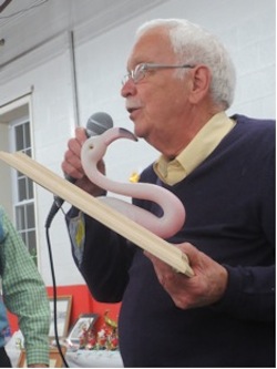 Chris Bannon received mounted pink flamingo head in recognition of his service.