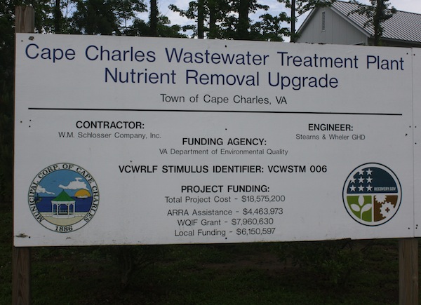 Signboard outside treatment plant shows a total cost of $18,575,200. Cost overruns and subsequent changes added another half million dollars which the Town must pay. (Wave photo)