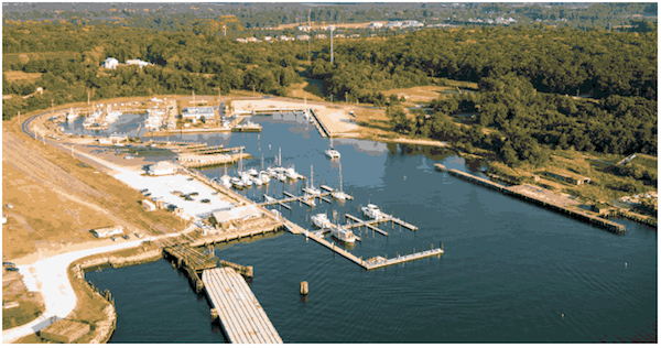 In this view of Cape Charles Town Harbor, the new Yacht Center will utilize the rectangular cutout at middle back of photo.