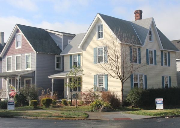 One house + two signs = violation