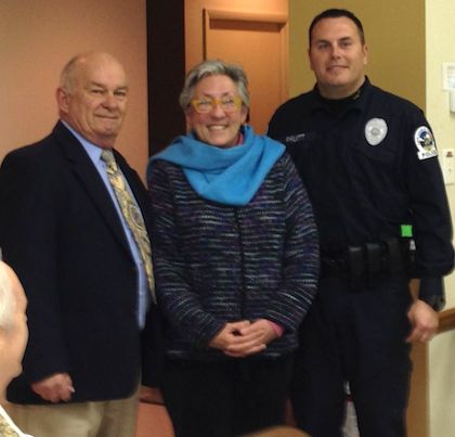 Former Chief "Sambo" Brown (now in civilian clothes), Mayor Dora Sullivan, and new Chief Jim Pruitt at Town Council meeting. (Wave photo)