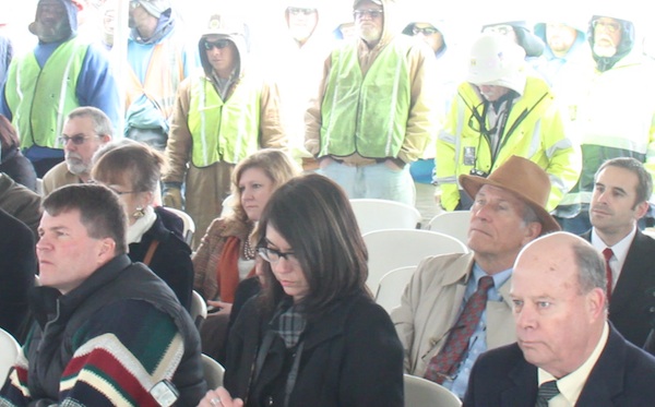 FACES IN THE CROWD: Bayshore treasurer John Chandler (far left), County Supervisors Granville Hogg (with fedora) and Vice Chairman Rick Hubbard on right.