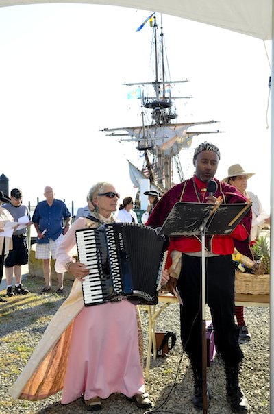 Strolling entertainers Carol & Malcolm serenade at last year's Tall Ships Cape Charles Festival ​