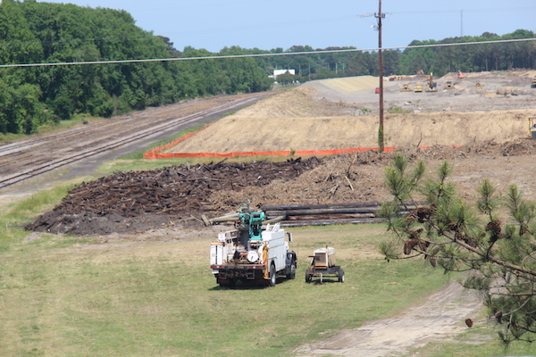 Pile of railroad ties in foreground were amassed by the Army Corps of Engineers while preparing the spoil containment area in the background. The photo was taken from the Hump. (Wave photo)